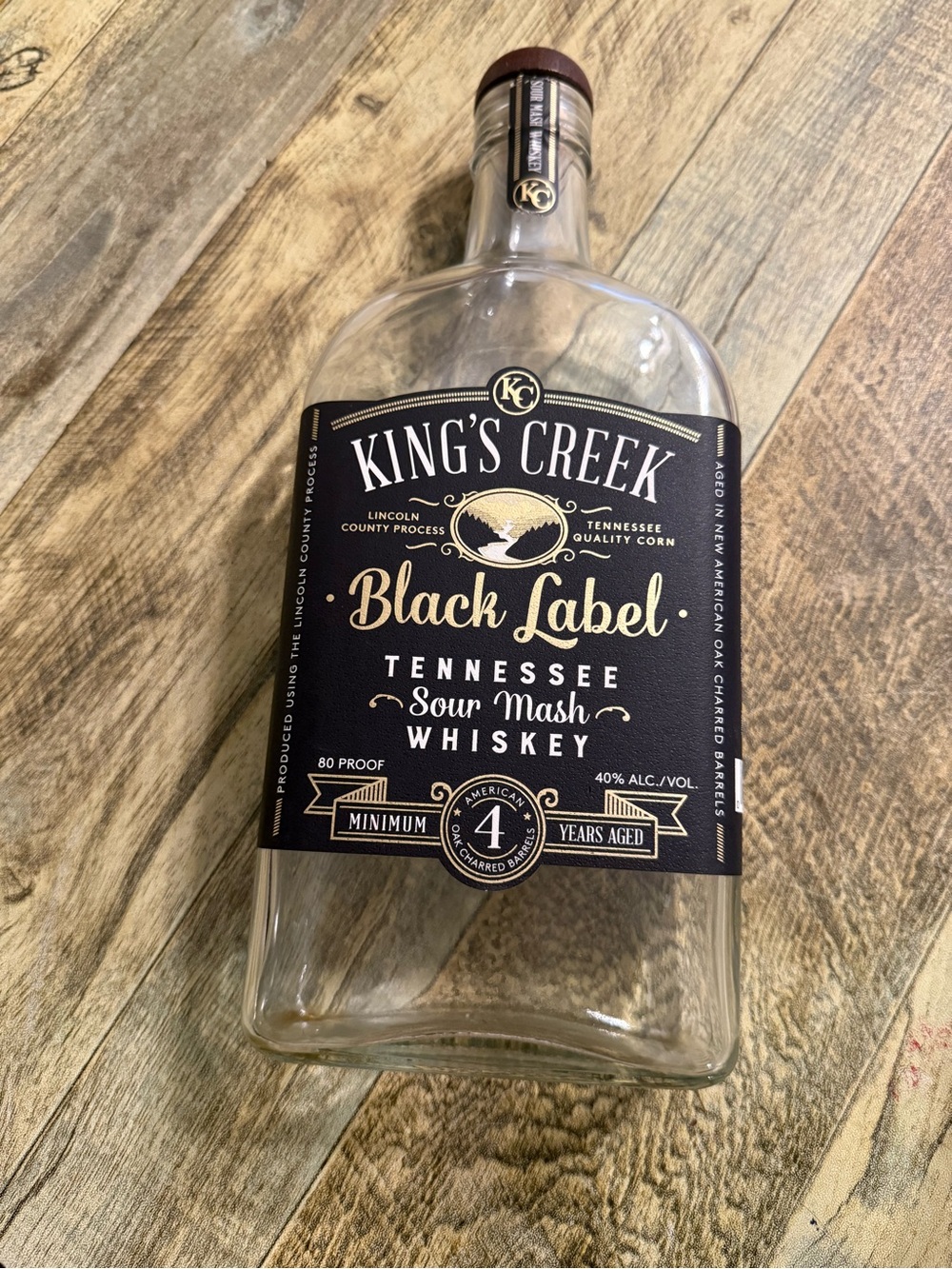 Thick heavy Glass Bottle with stopper. Great for storing your liquor/decoration.